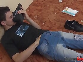 Gay dude sniffing shoe while tugging